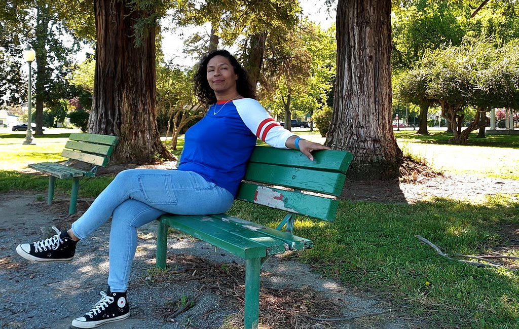 Lady on a bench enjoying nature